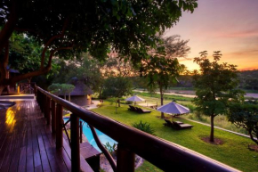 Отель Emhosheni River Lodge  Hoedspruit